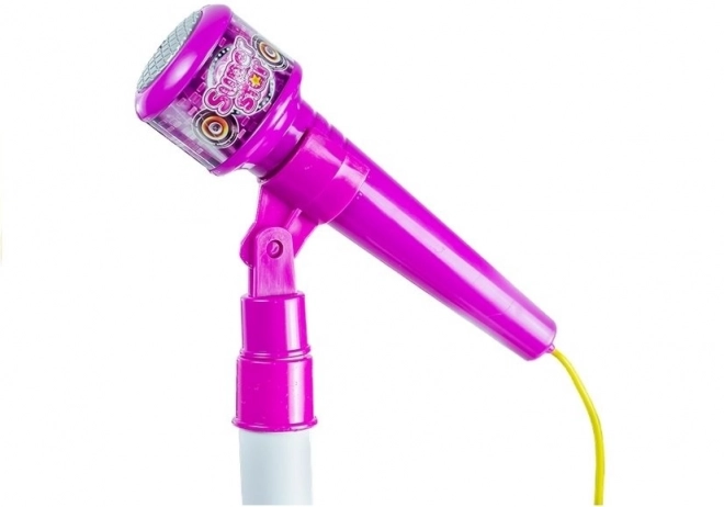 Ensemble rose avec microphone, trépied et projecteur