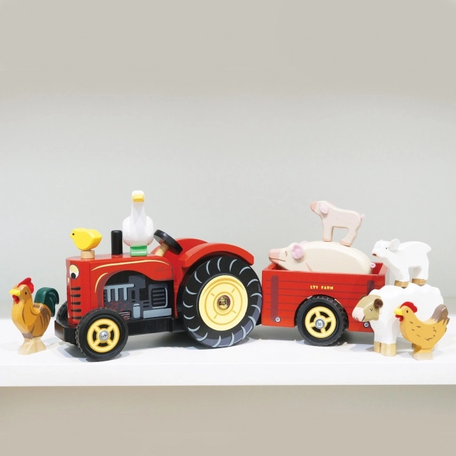 Le Toy Van tracteur rouge et remorque