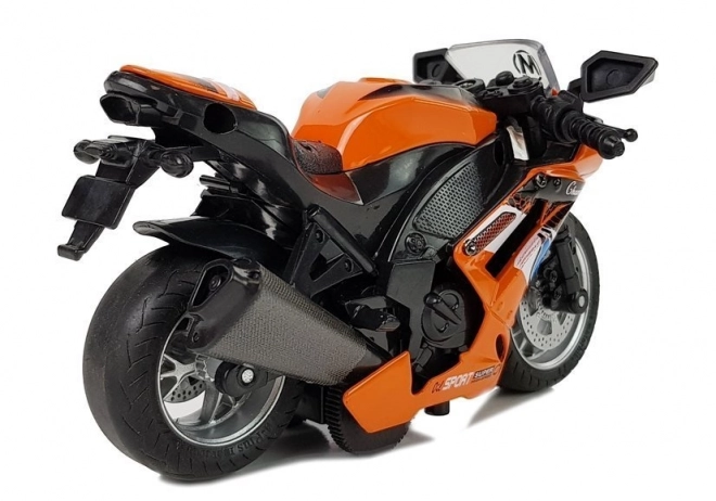 Jouet moto orange avec entraînement