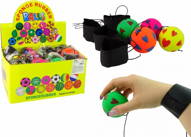 Balle en PU sur élastique 6 cm avec petits cœurs