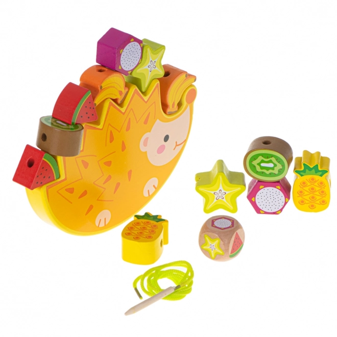 Jeu de laçage en bois avec hérisson et fruits