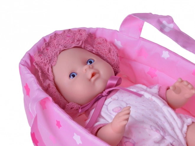 Poupée bébé avec porte-bébé