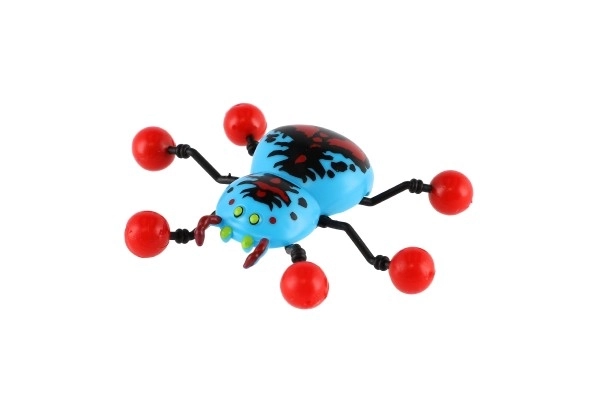 Araignée en plastique rampant sur verre 8x6cm 4 couleurs sur carte