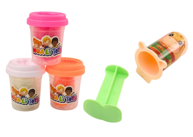 Trois pâtes à modeler colorées
