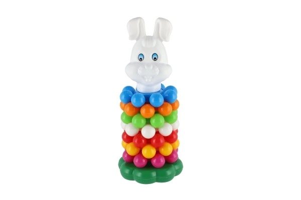 Puzzle pyramide avec anneaux en plastique 26cm dans un filet 12m+