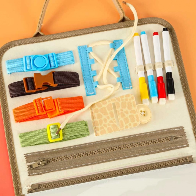 Valise sensorielle Montessori avec dinosaures
