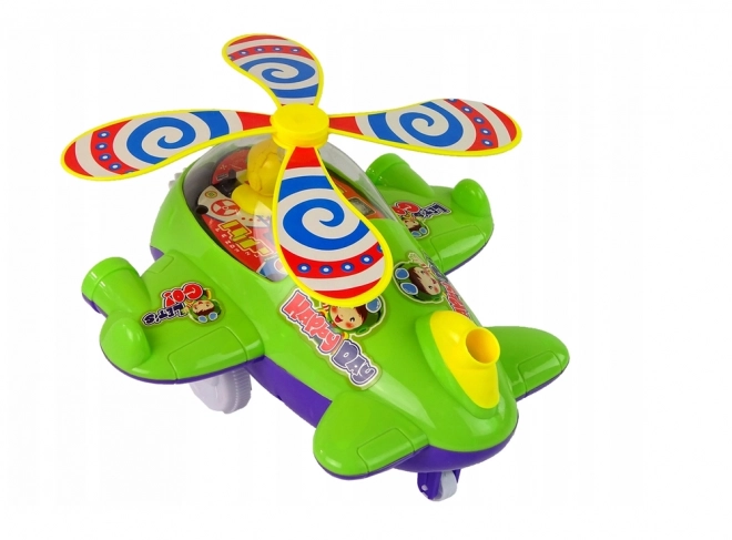 Hélicoptère pousseur vert avec pilote
