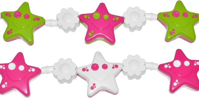 Chaîne pour poussette avec étoiles et fleurs