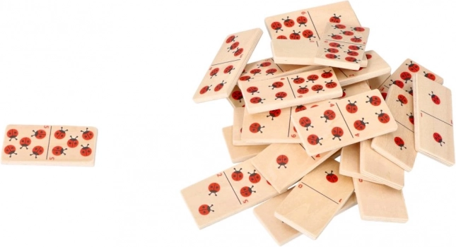 Dominos en bois avec des coccinelles