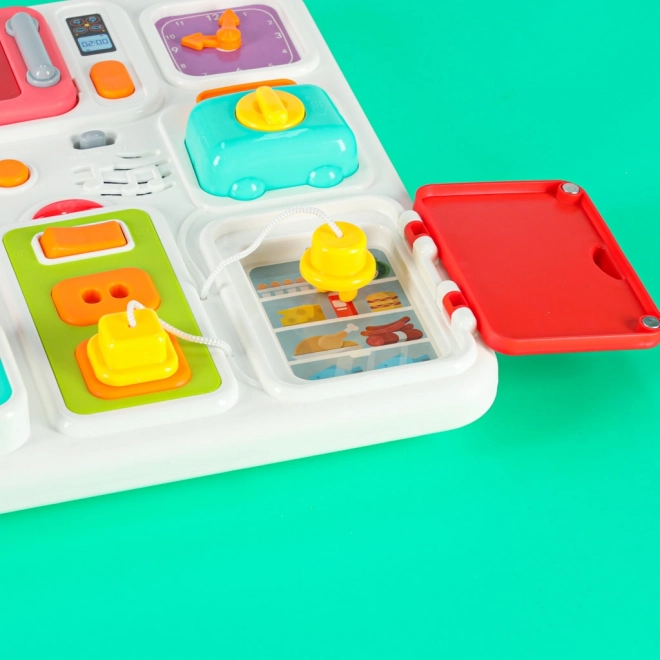 Tableau Montessori avec éléments de cuisine et apprentissage de l'heure