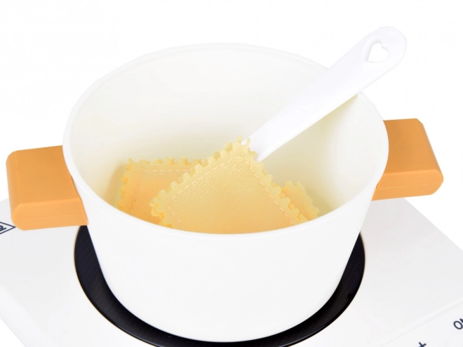 Cuisine pour enfants avec plaque à induction et accessoires