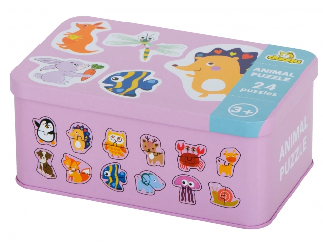 Puzzle avec motifs d'animaux dans une boîte en métal