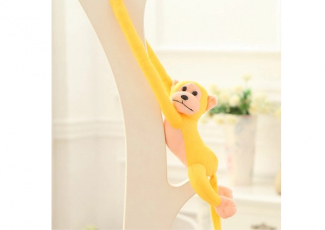 Mascotte singe en peluche avec son jaune 80 cm
