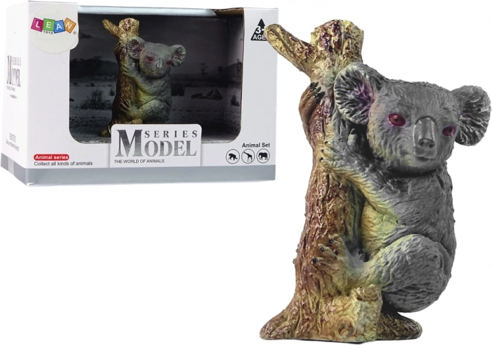 Figurine de koala sur un arbre – animaux du zoo