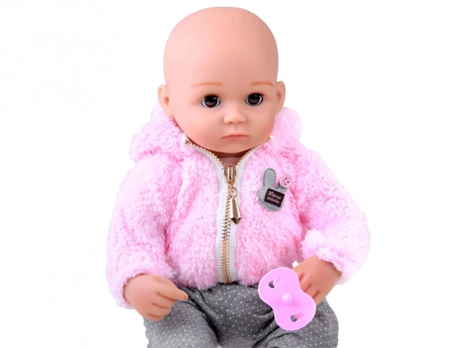 Poupée bébé en caoutchouc souple 43 cm