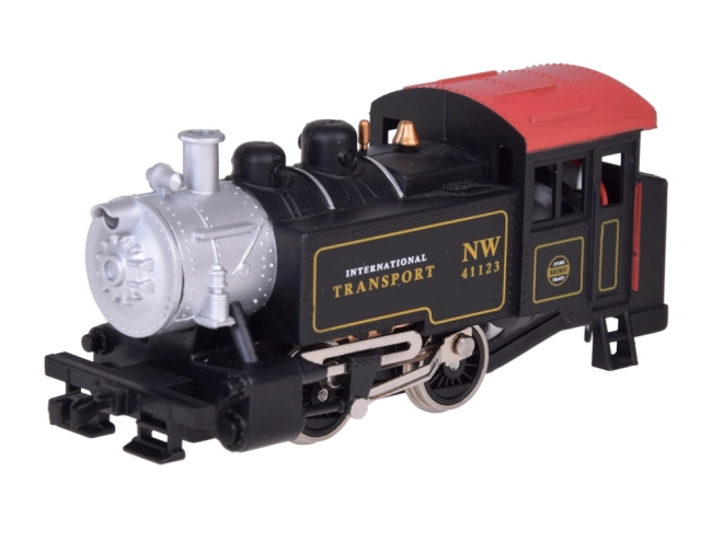 Ensemble de train électrique avec locomotive à vapeur classique et unité de contrôle