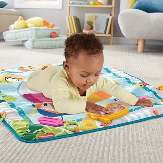 Tapis d’éveil Fisher Price à motif de piscine