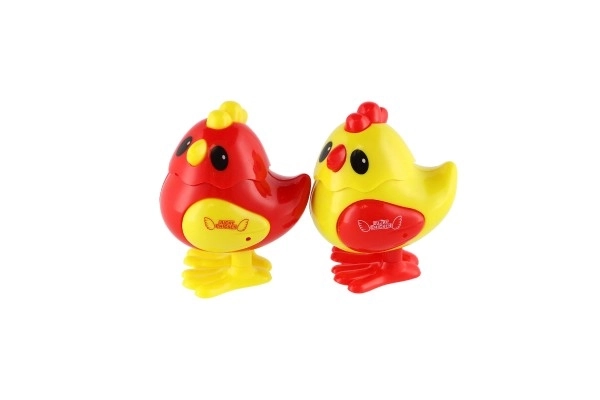Poussin à remonter plastique 7x9cm 2 couleurs 12 pièces en boîte