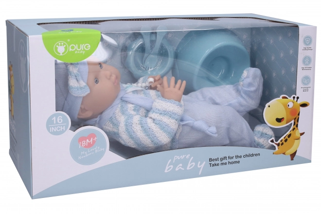 Bébé en salopette bleue 40 cm