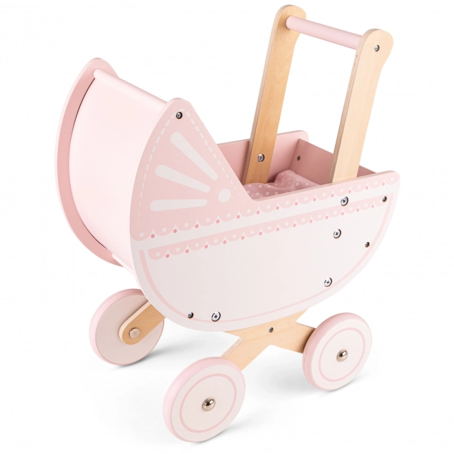 Chariot en bois rose pour poupées avec couverture