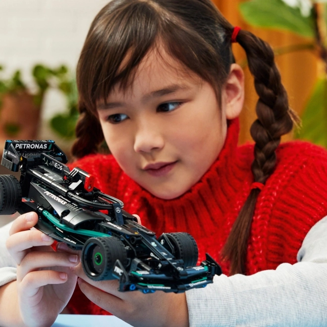 Véhicule à traction à rétrofriction