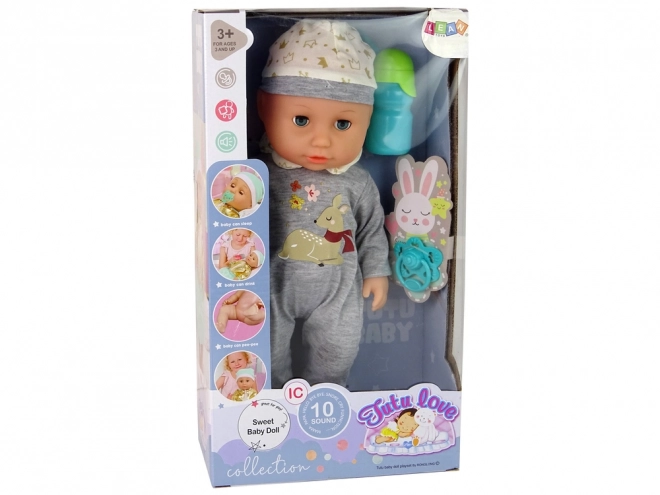 Poupon Poupée en Pyjama Gris avec Sons et Accessoires