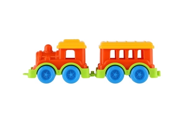 Petit train en plastique avec wagon