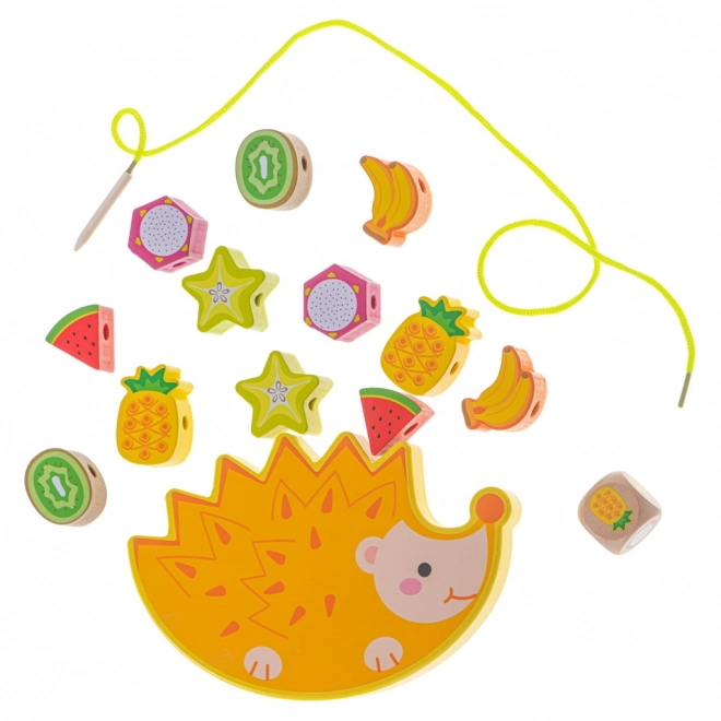 Laçage avec pièces de fruits en bois