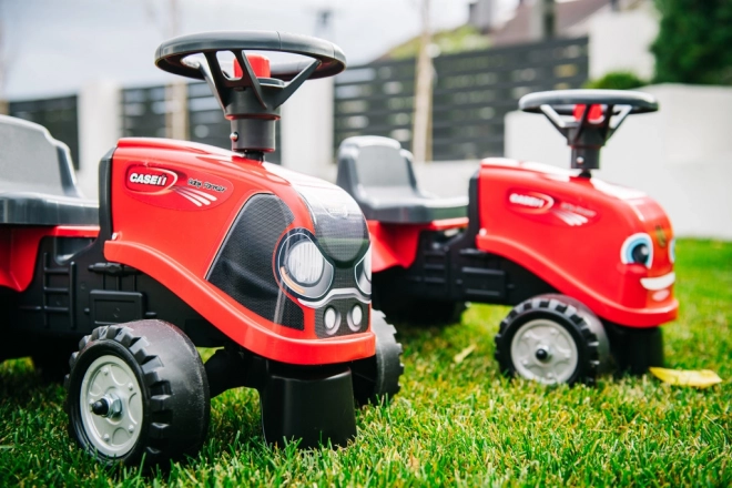 Tracteur à pédales Baby Case IH rouge avec remorque
