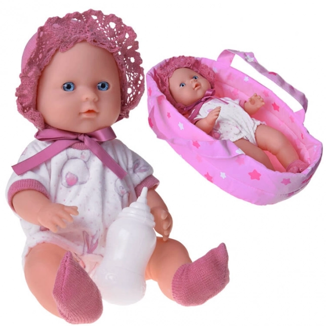 Poupée bébé avec porte-bébé