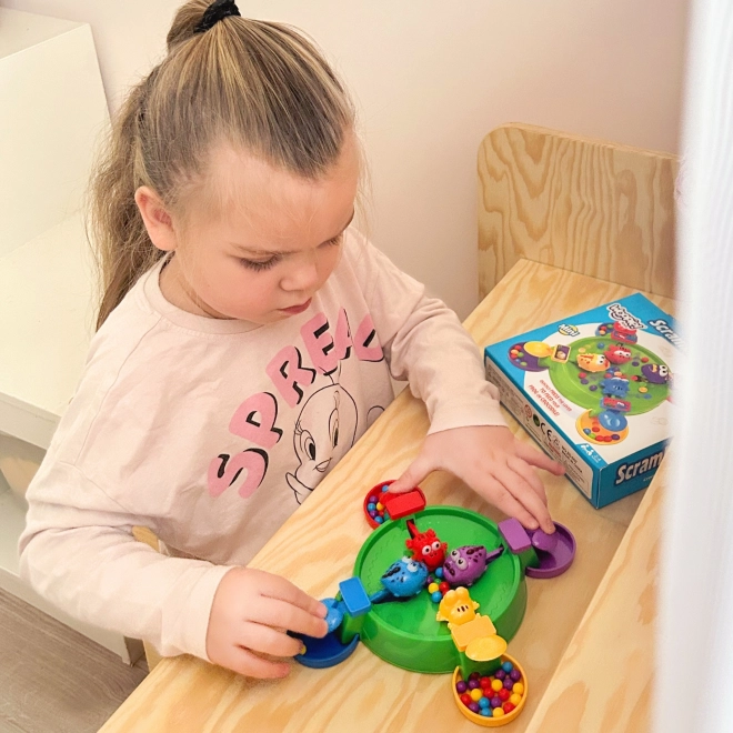Jeu amusant de grenouilles joyeuses et crocodiles affamés