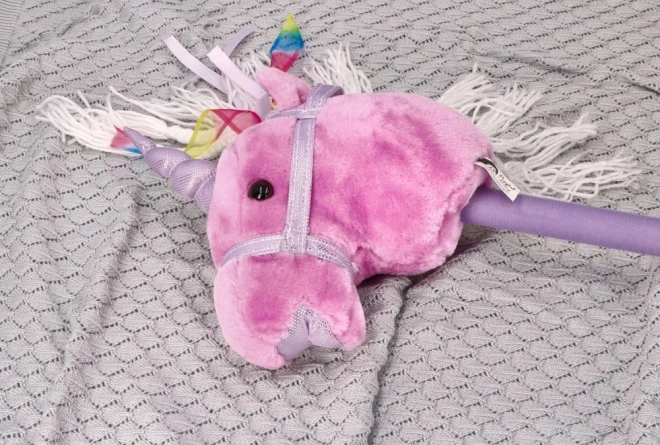 Licorne à bascule sur bâton Rosa