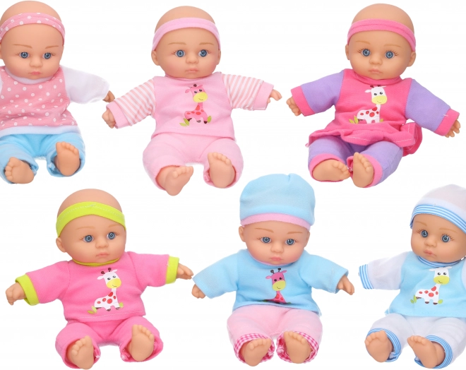 Adorable bébé avec vêtements 24 cm