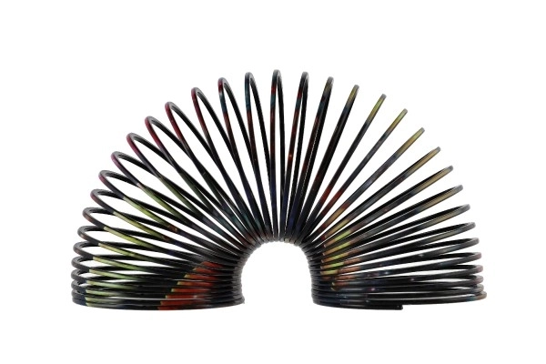 Spirale/ressort cosmique en plastique diamètre 6,5 cm 2 couleurs dans une boîte 7x7x7cm