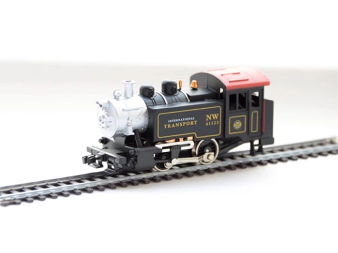Ensemble de train électrique avec locomotive à vapeur classique et unité de contrôle