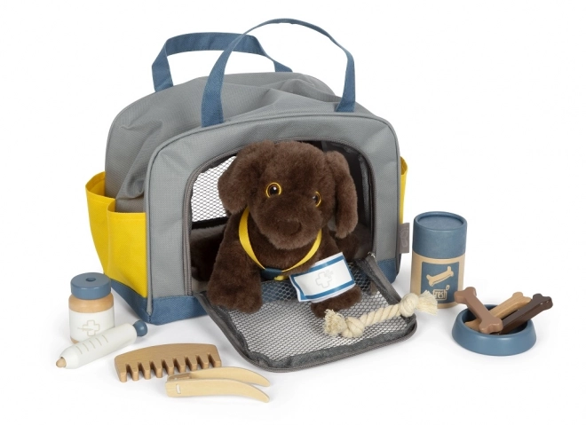 Petit chien en peluche avec set de soins