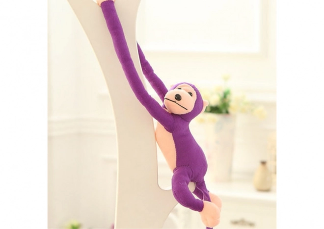 Mascotte en peluche Singe avec son Violet 80 cm