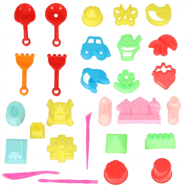 Jouets colorés pour le sable - pelles et moules