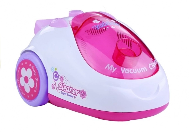 Aspirateur rose pour enfants à piles avec deux embouts