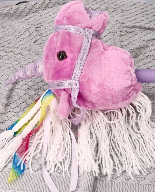 Licorne à bascule sur bâton Rosa