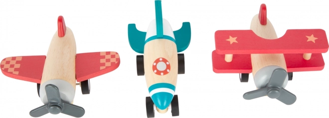 Jouets en bois à remontoir – avions et fusée