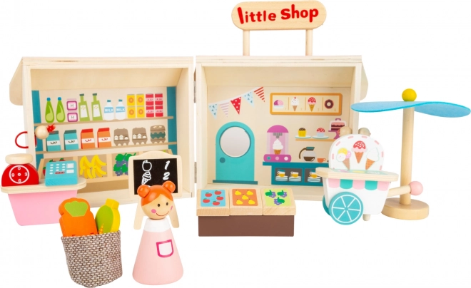 Boutique en bois dans une valise de Small Foot