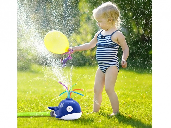 Pulvérisateur d'eau joyeux en forme de baleine
