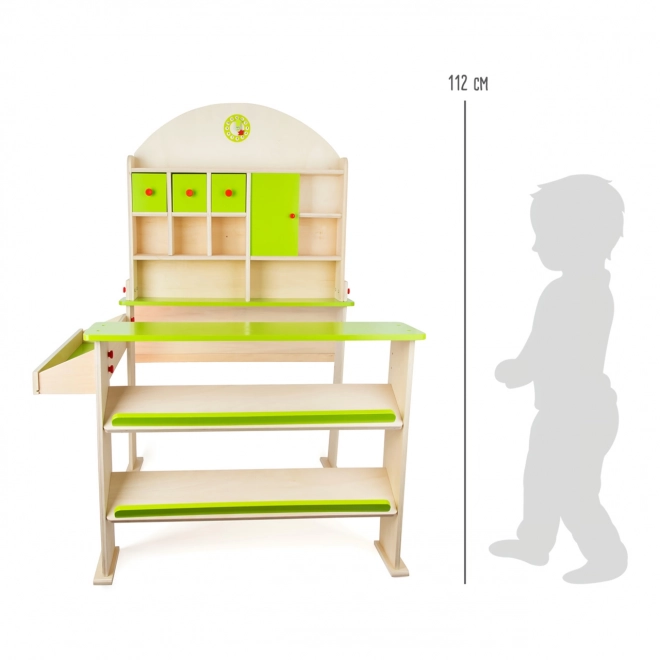 Petit stand de marché vert en bois
