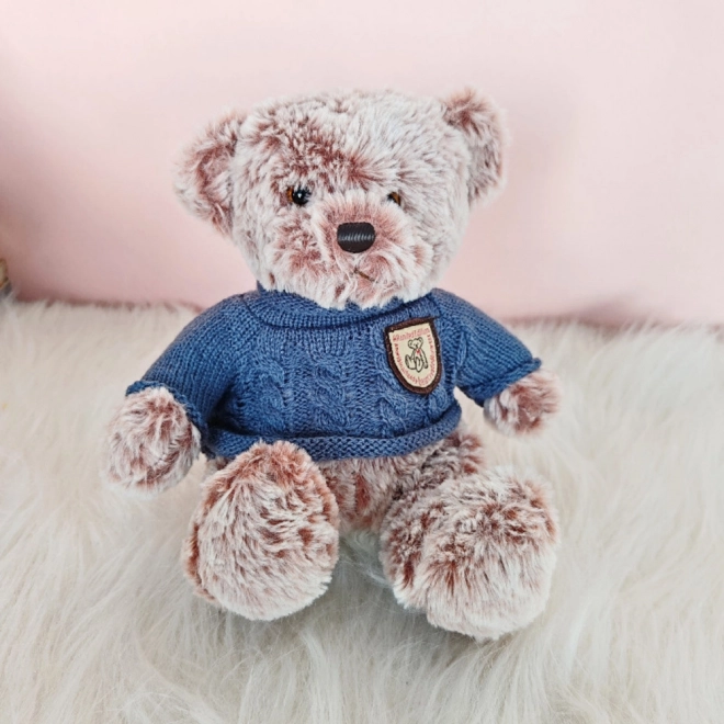 Ourson en peluche avec pull bleu 21cm