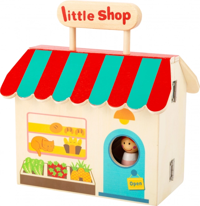 Boutique en bois dans une valise de Small Foot
