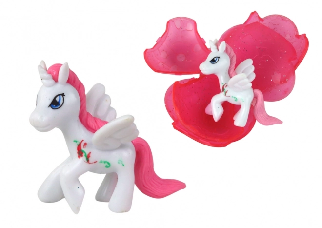 Œuf magique de licorne qui éclot rose 6cm