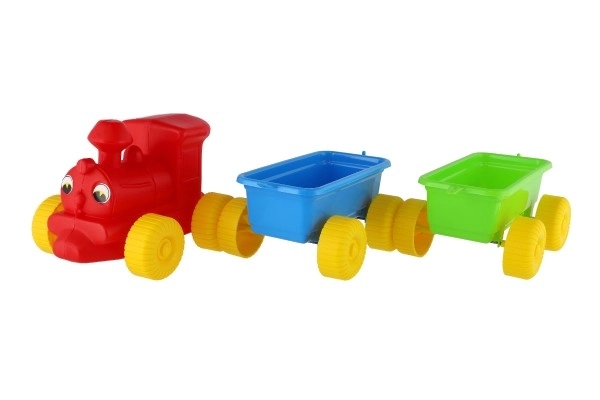 Train + 2 wagons en plastique 60 cm dans un filet