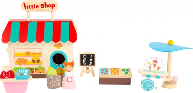 Boutique en bois dans une valise de Small Foot