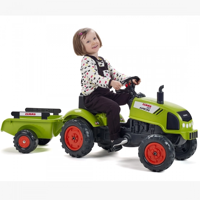 Tracteur à pédales Claas Arion 410 avec remorque